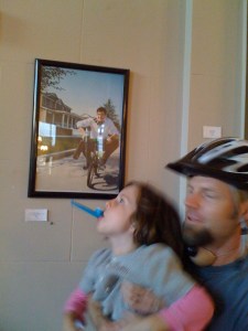 Mike & Luct at CSUCI take in biz bike rider iPhone photo by Art Predator