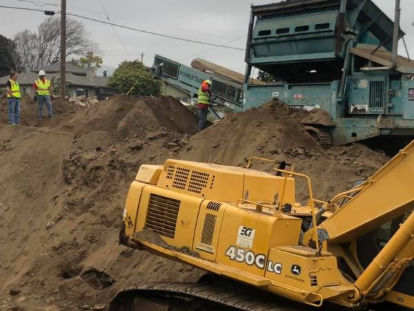 This hole goes down 60' -- the area at 1570 Thompson was used as a landfill so now it must be sorted before it can be compacted and built on. 